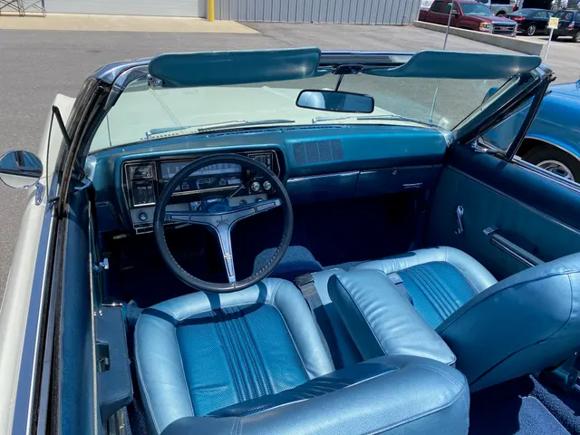 White SST convertible dashboard and blue cabin