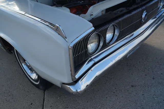 1967 Dodge Charger full-width grille and concealed-headlamp detail