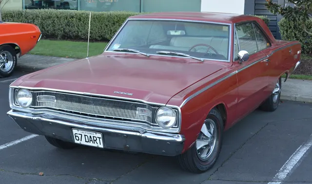 Exact-year stock-presenting view retained for body, trim, glass, lamps, bumpers, and wheel context; restoration details remain specific to the photographed car.