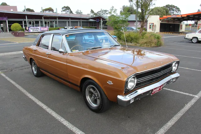 Exact-year restored XR GT display view retained for body, stripe, wheel, and model-year context; display signage and restoration claims require independent verification.