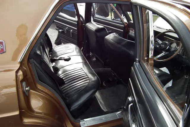 Exact-year XR GT rear three-quarter view showing the boot stripe, tail panel, rear identification, roofline, and wheel treatment.