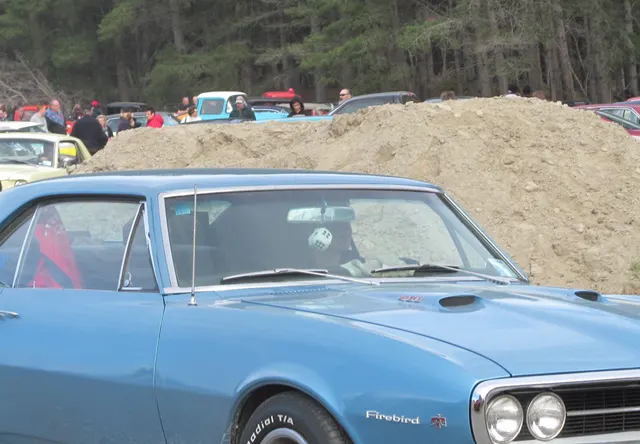 1967 Firebird 400 front and hood detail crop; scoops and emblems need paperwork before proving drivetrain originality.