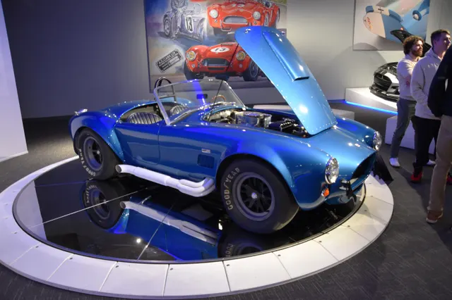 Exact-year S/C museum display with open hood and competition-derived exhaust, wheels, tires, and cockpit equipment. It remains special-configuration history only.
