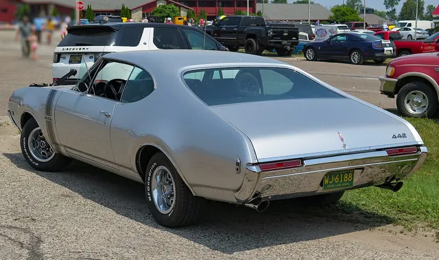 1968 Oldsmobile 4-4-2 in Peruvian Silver photographed by Elise240SX; used as same-year 4-4-2 rear and color context.