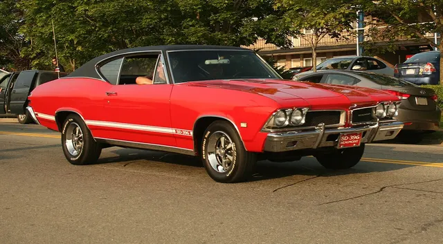 1968 Beaumont SD profile with the factory-style body stripe; wheels and radial tires are non-stock and are not specification evidence.