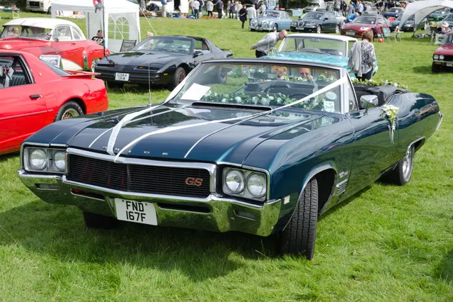 1968 Buick GS 400 convertible at a show; temporary event decoration is not factory equipment
