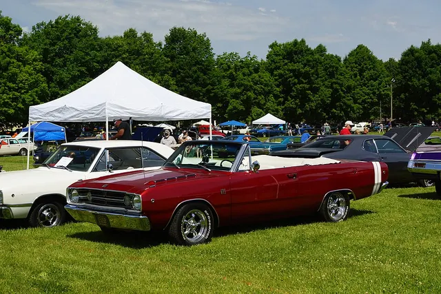 Red 1968 Dodge Dart GTS convertible showing the open body and white Bumble Bee stripe