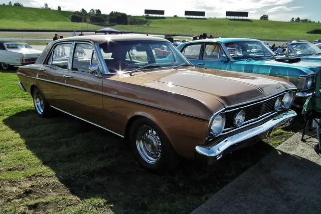 Exact-year XT GT detail view documenting restored trim, stripe, glazing, and wheel treatment; removable details do not prove identity.