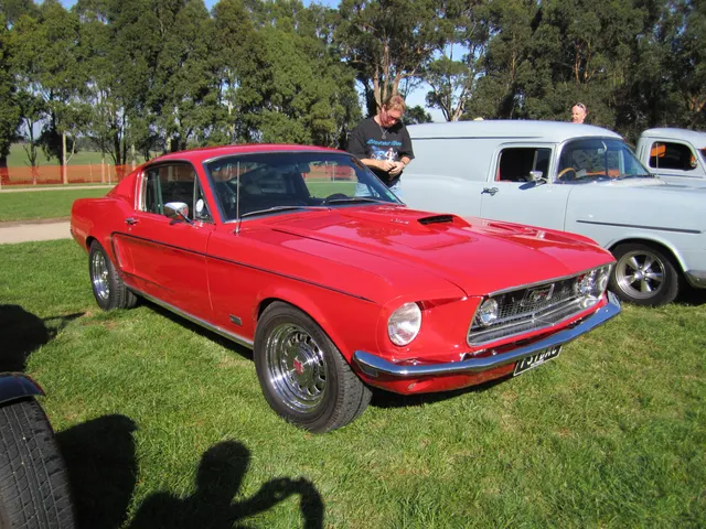 Stock-presenting 1968 Ford Mustang GT fastback identified as a 428 Cobra Jet, showing the GT trim, Ram Air hood scoop, and factory-style exterior details