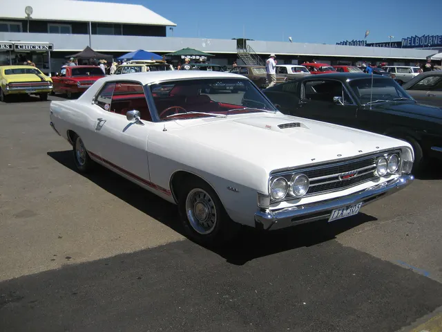 Stock-presenting 1968 Ford Torino GT hardtop retained for exact-year GT body, grille, roofline, side trim, glass, and wheel-cover context; the photographed car is identified as a 390 and does not prove the 428 Cobra Jet option.