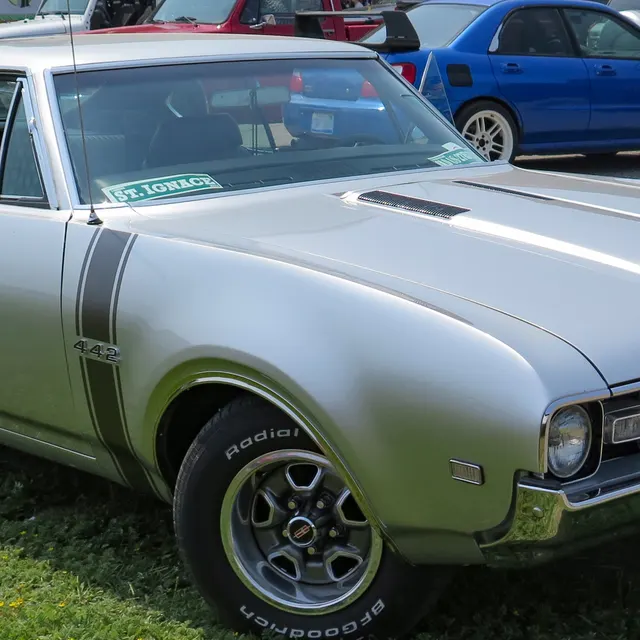 Front trim detail crop from a 1968 Oldsmobile 4-4-2 image; visual context only.