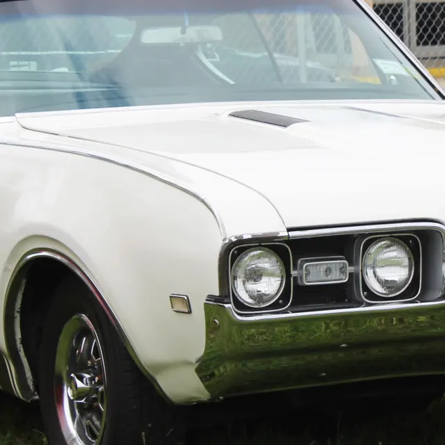 Grille detail crop from a 1968 Oldsmobile 442 image; visual trim context only.