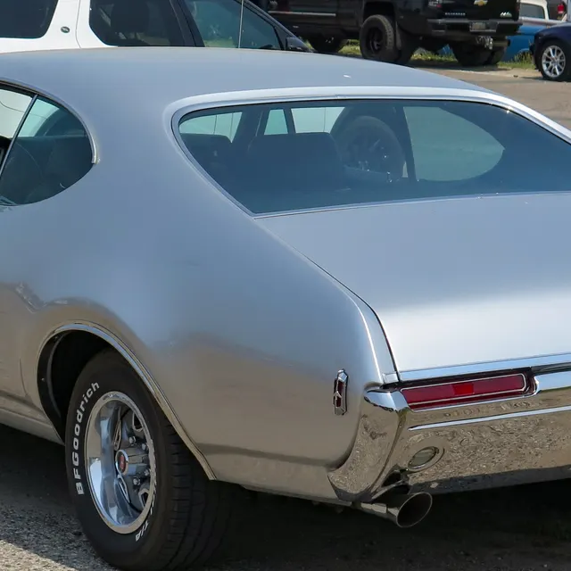 Rear trim detail crop from a 1968 Oldsmobile 4-4-2 image; visual context only.