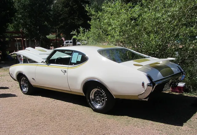 1969 Oldsmobile 442 Hurst image by John Lloyd; exact-year Hurst/Olds lineage and exterior context.