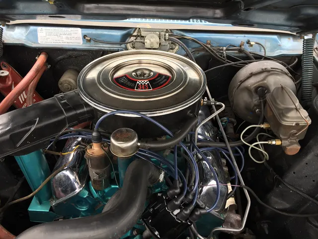 Exact-year Javelin 343 engine bay retained for engine, air-cleaner, brake, firewall, and service-label context; hoses, ignition parts, finishes, and condition remain car-specific.