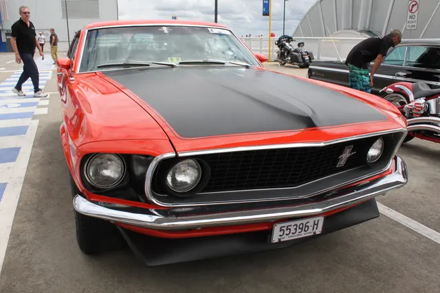 1969 Boss 302 side profile; reviewed as representative SportsRoof and C-stripe context.