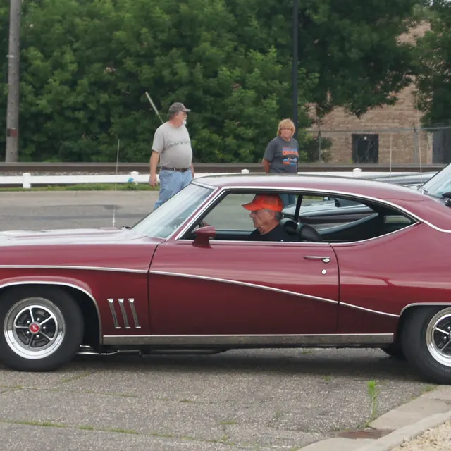 Side trim detail crop from a 1969 Buick GS image; visual trim context only.