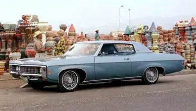 Period/factory 1969 Impala Custom Coupe image for body-style context; not an SS427 package proof image.