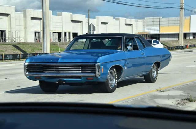Exact-year Impala SS coupe exterior view with visible SS fender emblem and model-year body details; the photograph does not establish an SS427 drivetrain.
