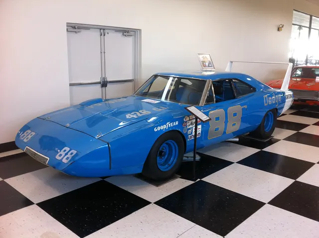 Buddy Baker 1969 Dodge Daytona display at the International Motorsports Hall of Fame; reviewed as period-racing context.