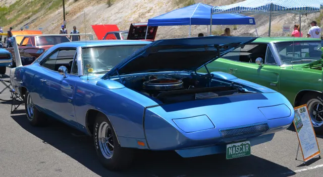 1969 Charger Daytona engine bay identified by the photographer as a Hemi installation; useful for representative engine-layout context without proving this car's factory drivetrain or component originality.