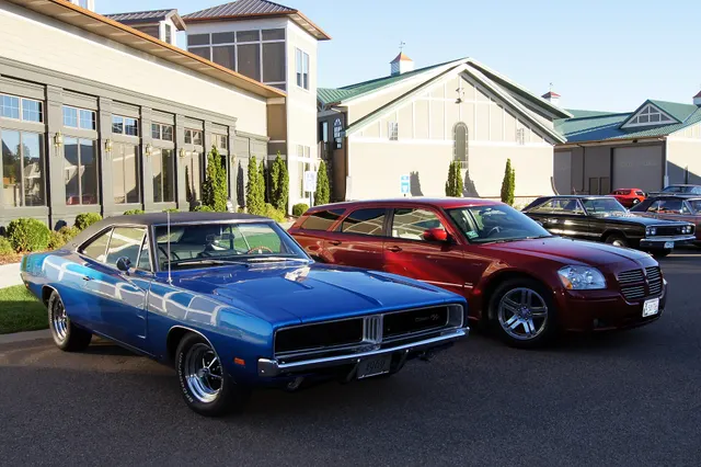1969 Dodge Charger R/T shown beside a later Dodge Magnum R/T; reviewed as Mopar lineage and scale context.