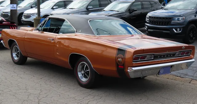 1969 Dodge Coronet Super Bee rear-left view; rear-quarter and stripe context, not standalone Hemi proof.