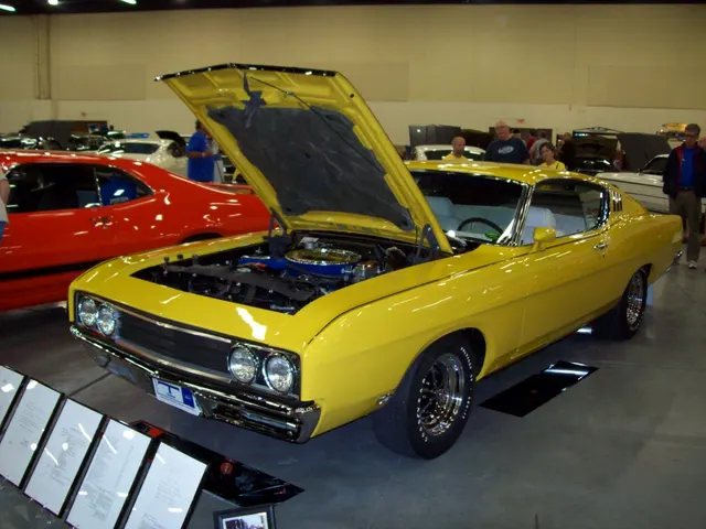 Bunkie Knudsen's one-off yellow Talladega special with its hood open, retained only as Ford executive and model-history context rather than regular-production reference.
