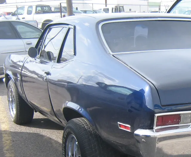Local crop showing 1969 Nova SS front grille and trim context.