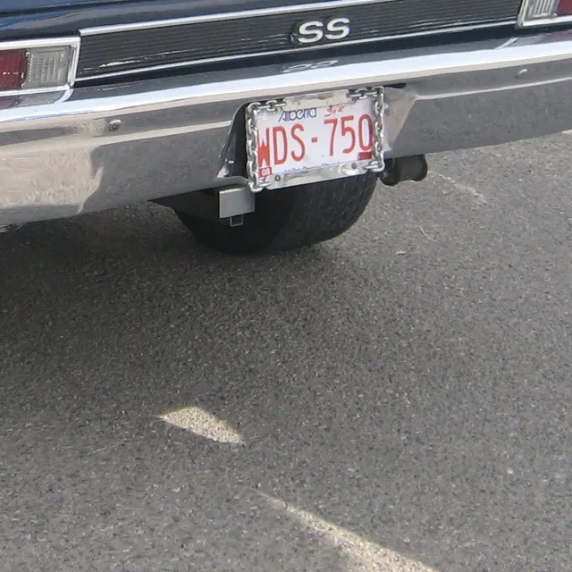 Local crop showing wheel and lower-body detail on a 1969 Nova SS photo.
