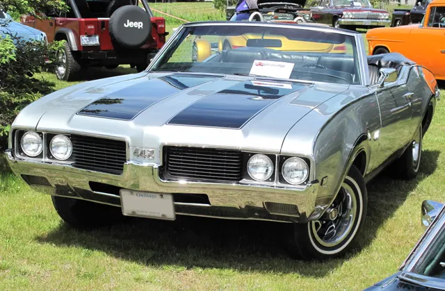 1969 Oldsmobile 442 front view in Flamingo Silver; exact-year color and fascia context.