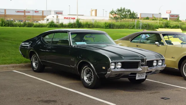 1969 Oldsmobile 442 at an Oldsmobile club meet; exact-year enthusiast-history context.