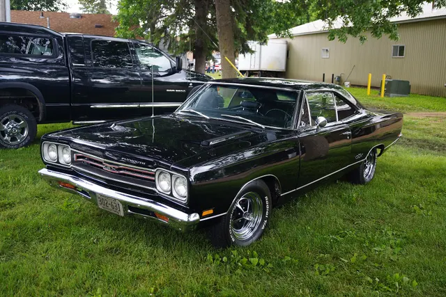 1969 Plymouth GTX exterior angle for hardtop roofline and stance context.