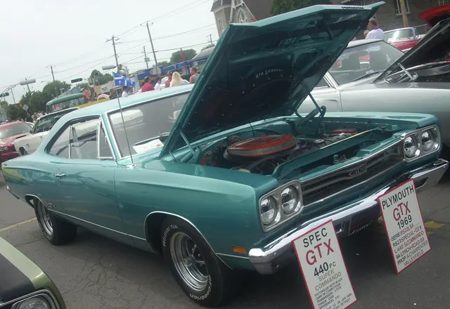 1969 Plymouth GTX show-field exterior; not standalone proof of original drivetrain.
