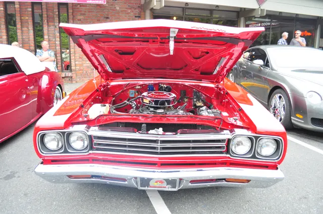1969 Road Runner engine compartment detail; representative engine-bay layout context, not Hemi originality proof.