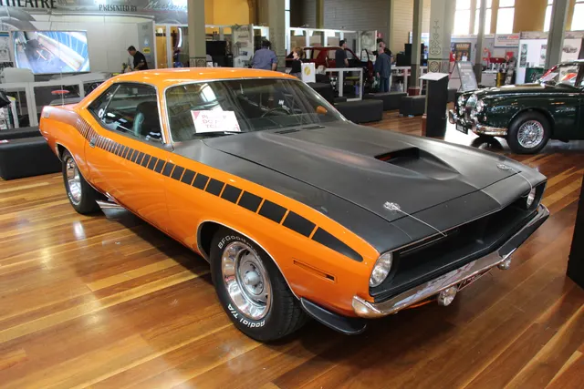 1970 Plymouth AAR Cuda 340 side view showing the strobe stripe and E-body hardtop stance.