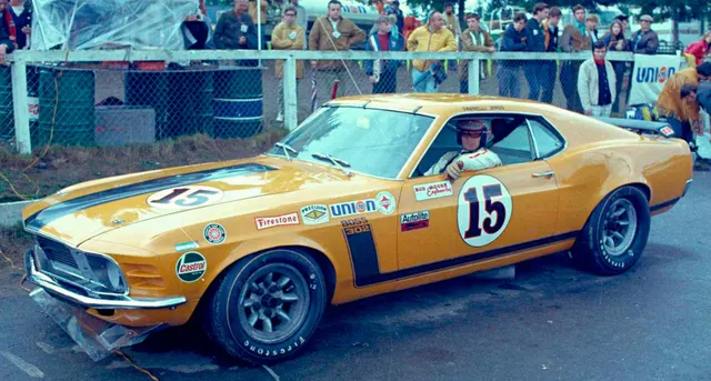 This image shows Parnelli Jones sitting in the driver's seat of his 1970 Boss 302 Mustang.  Jones would go on to win both the Driver and Manufacturers Championship