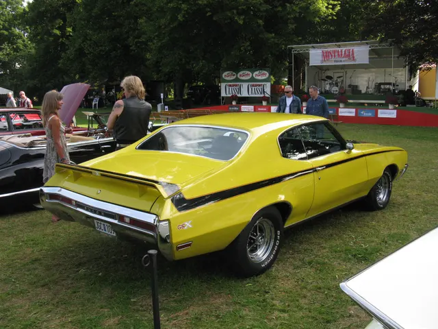 1970 Buick GSX rear-quarter profile in Saturn Yellow, useful for spoiler, stripe, wheel, and stance reference