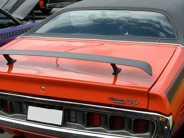 Detail crop from the approved rear Charger R/T image showing tail-panel and rear trim context.