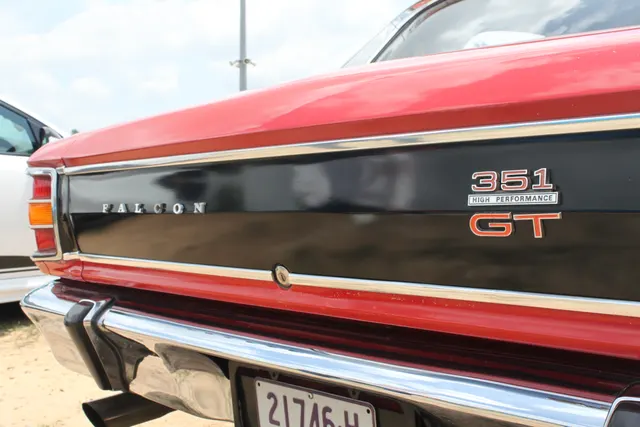 Exact-year regular XW GT detail view documenting hood, stripe, lamps, badges, glass, and wheels; removable trim is not identity proof.