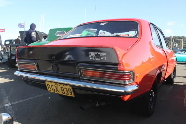 Exact-year XU-1 rear view documenting the black tail treatment, rear spoiler, XU-1 decal, lamps, bumper, and wheel treatment.