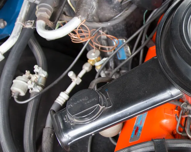 Local crop showing broader 454 engine-bay detail from an approved Monte Carlo SS image.