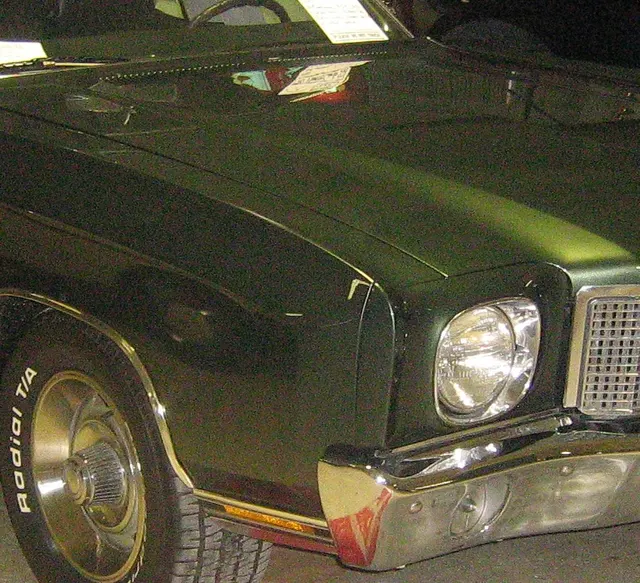 Local crop showing wheel and lower-front presentation on a photographed 1970 Monte Carlo SS.