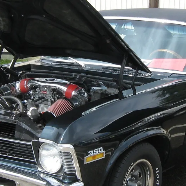 Local crop showing wheel, tire, and lower-body stance context on a 1970 Nova SS.