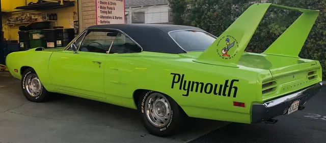 Closer rear-wing and deck graphic context derived from the approved Superbird rear view.