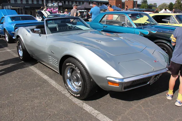 Silver 454-badged convertible in front three-quarter view. The modern tires and badges are context, not proof of an original LS5 or LS6 installation.