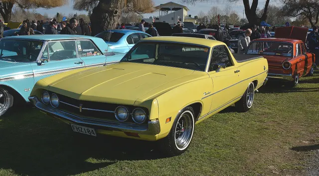 Same exact-year Ranchero front three-quarter view retained for the grille, quad lamps, hood, fenders, windshield, roof, mirror, molding, wheels, and stance.