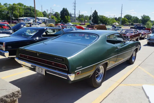 Green 1971 Ford Torino GT rear three-quarter view; exact-year GT context