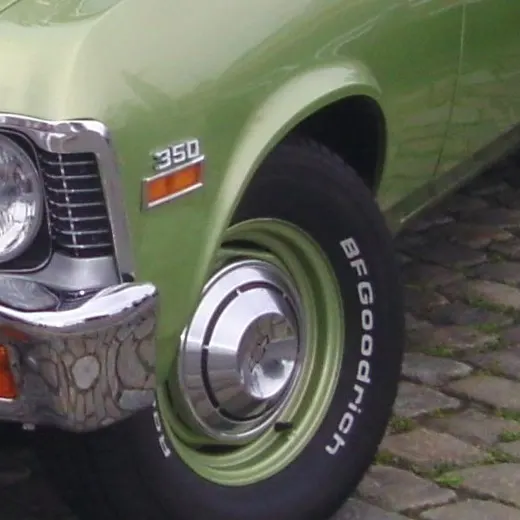 Local crop showing the 350 fender badge and front wheel context.