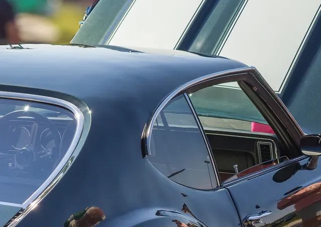 1971 Oldsmobile 4-4-2 rear trim detail crop; same-year rear appearance context.